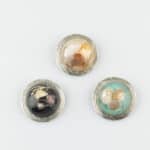 Chunky round dome beach brooch.