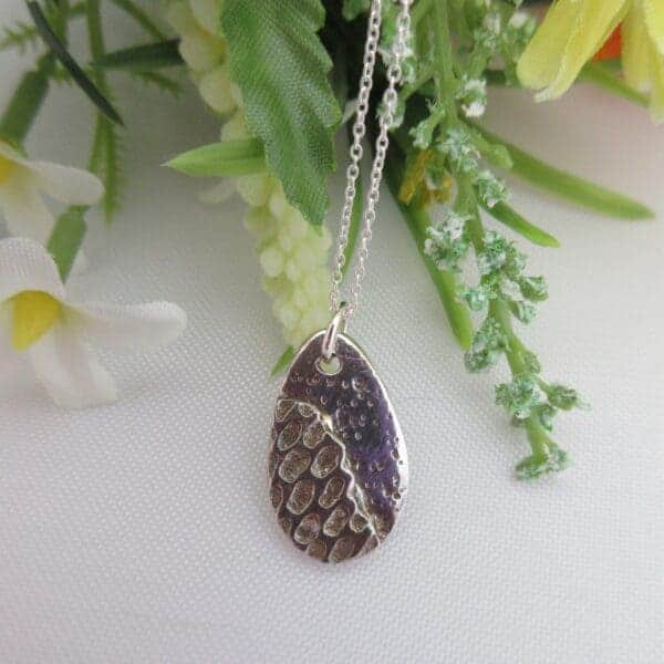 Handcrafted silver egg pendant by Indigo Berry