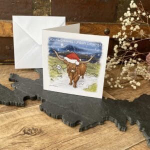 Christmas card - Highland Cow with greeting in Gaelic & English
