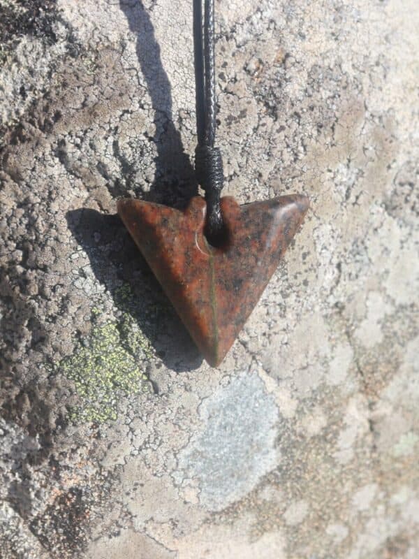 Red Hebridean Stone arrowhead pendant - handmade by Gneiss Things