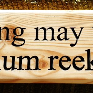 Lang may yer lum reek engraved on a wooden plaque