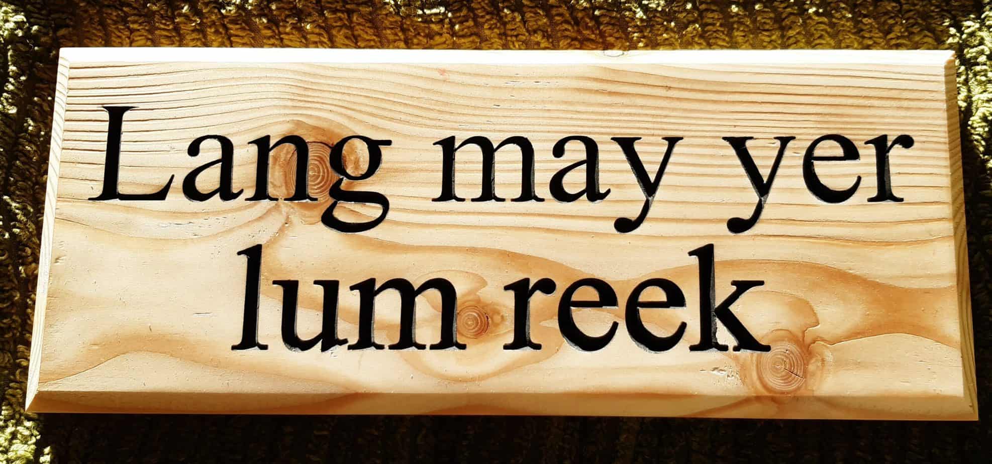 Lang may yer lum reek - handmade wooden sign from Arran