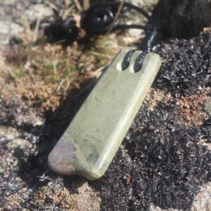 Pale dual hole greenstone pendant - handmade by Gneiss Things (view 2)