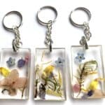 Garden flower resin keyrings.