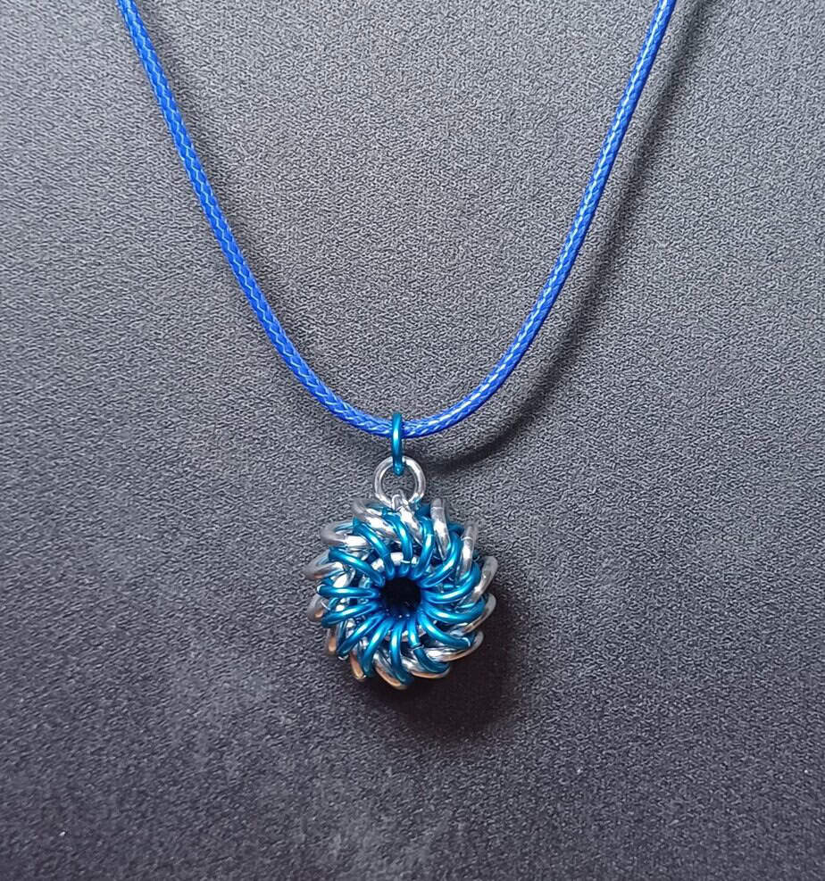 Blue and Silver Whirligig Pendant - Image 1