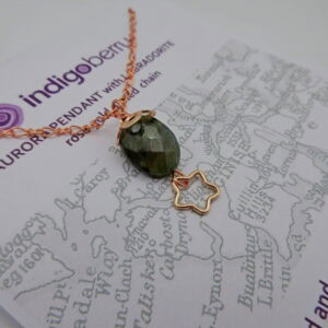 Aurora Pendant featuring labradorite on rose gold plated chain.