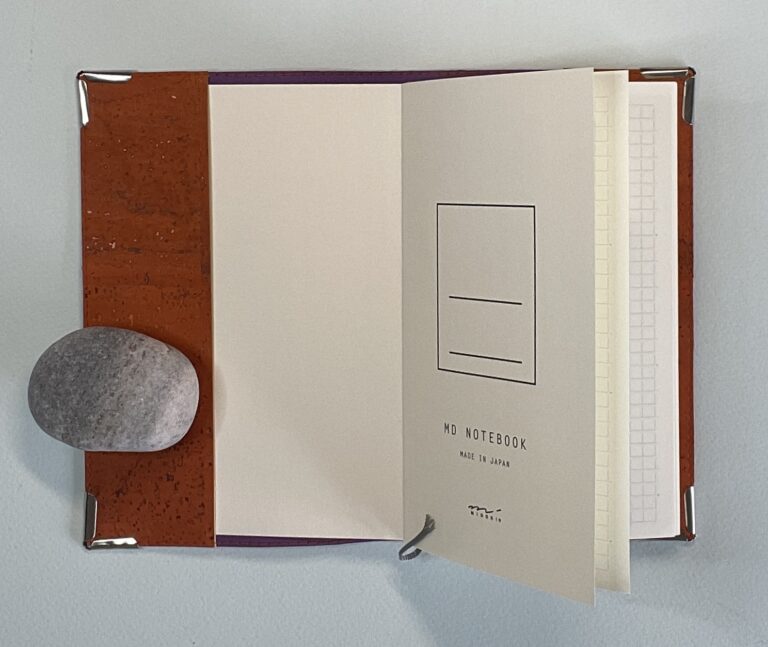 Pocket sized Orange Cork Cover with B6 Midori Squared Notebook, opens flat