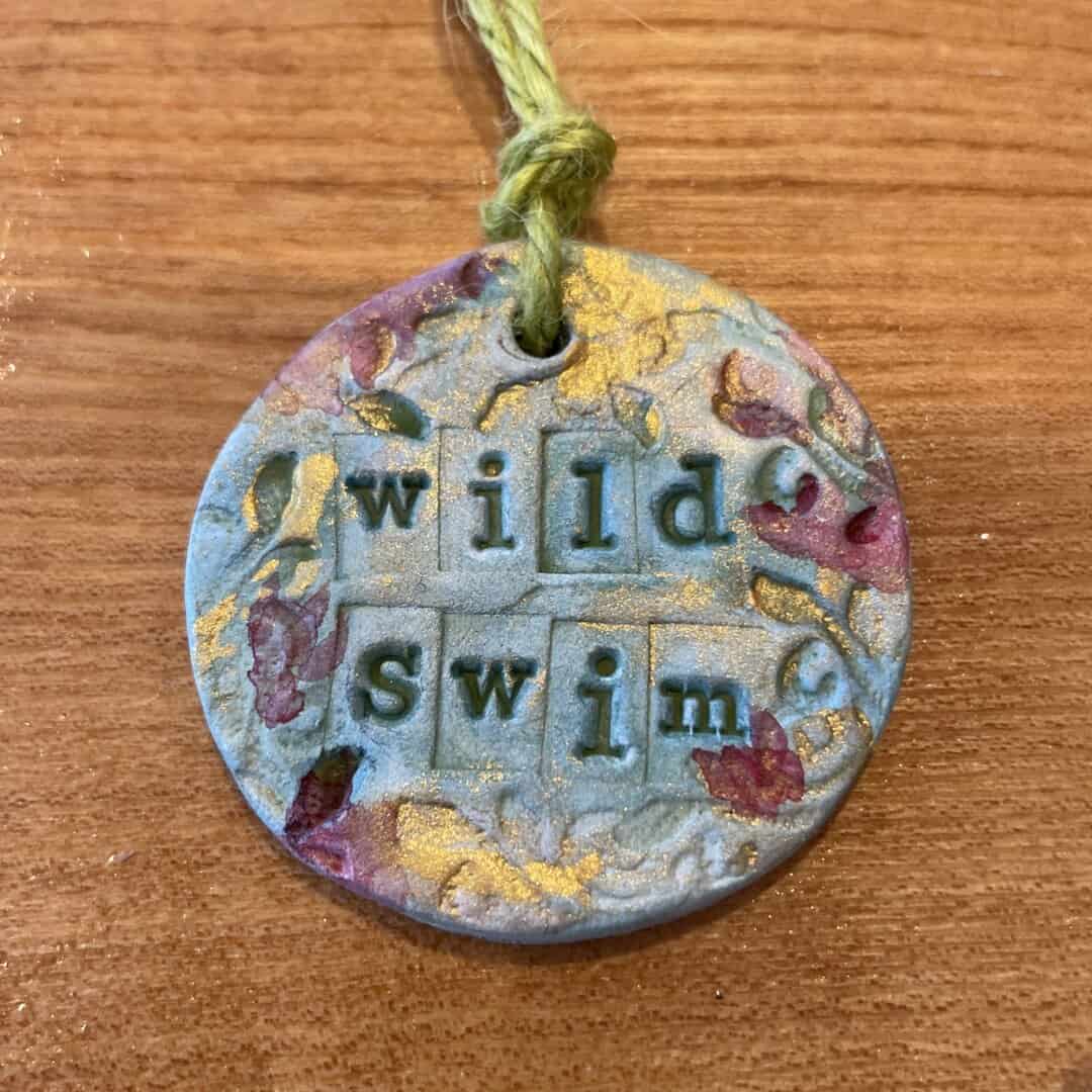 Wild swim handmade ceramic hand painted Christmas decoration - Image 1