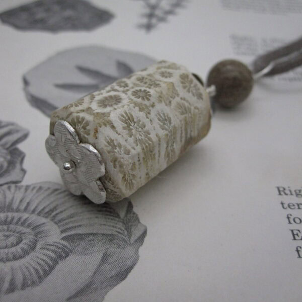 Fossil jasper pendant with simple silver plated bead caps and a single focal bead of deep brown jasper on a grey leather cord. Designed and created in the Isle of Skye.