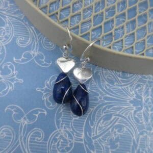 Earrings with silver plated heart and lapis lazuli.