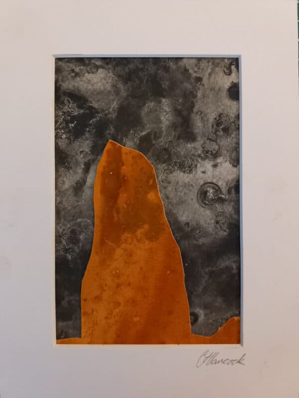 Old Man of Storr with Rust stained stone and seaweed pressed dark sky