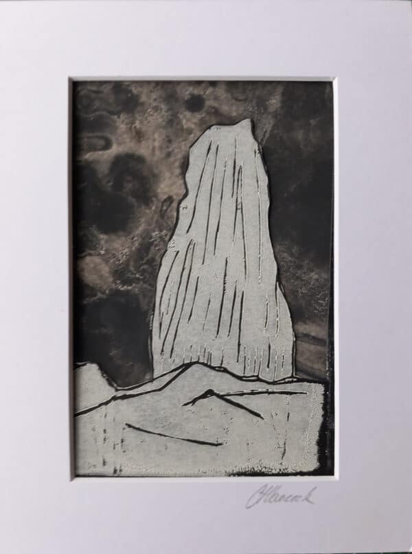 Lino print of the Old Man of Storr with seaweed pressed dark sky