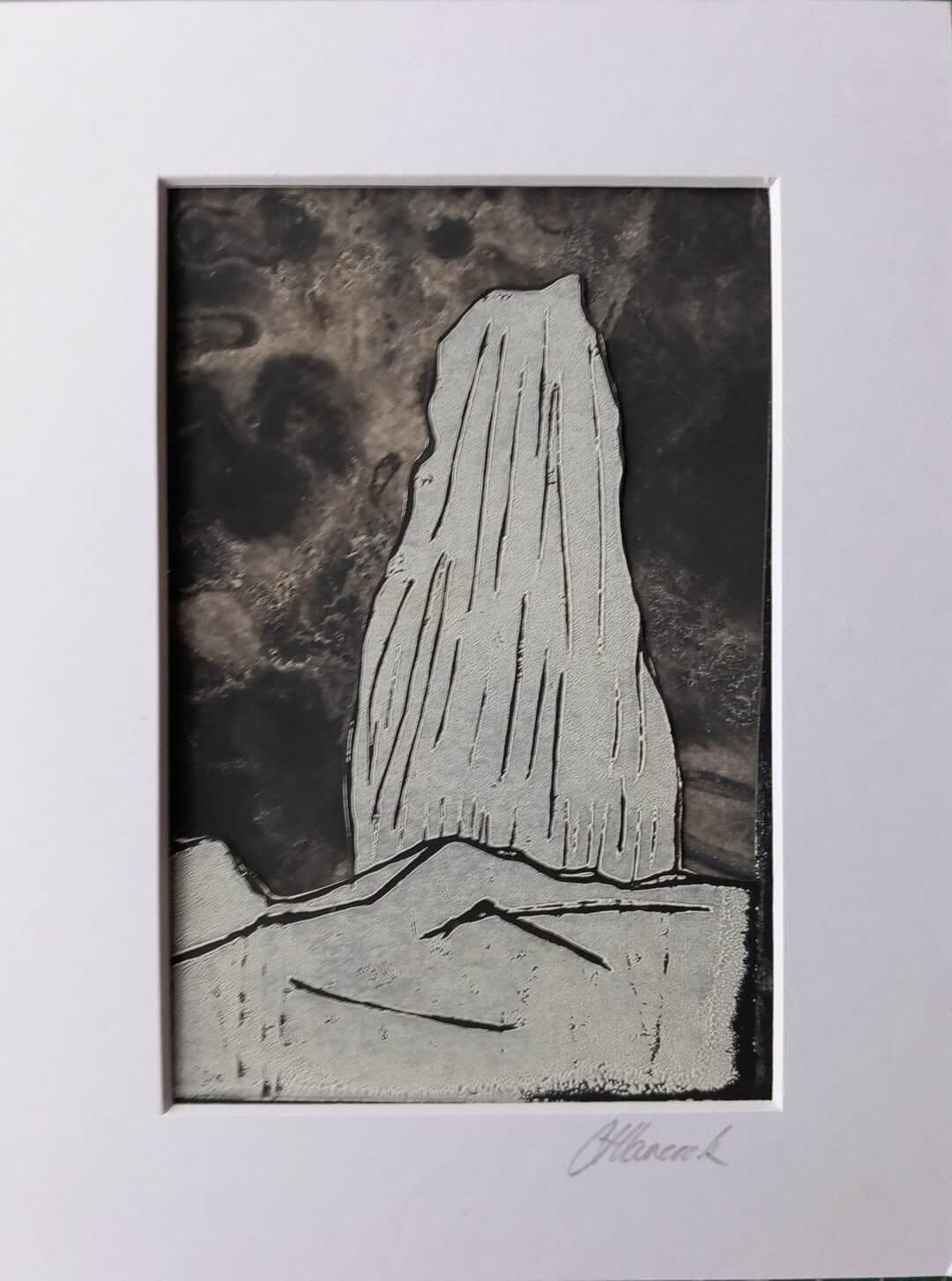 Lino print of the Old Man of Storr with seaweed pressed dark sky