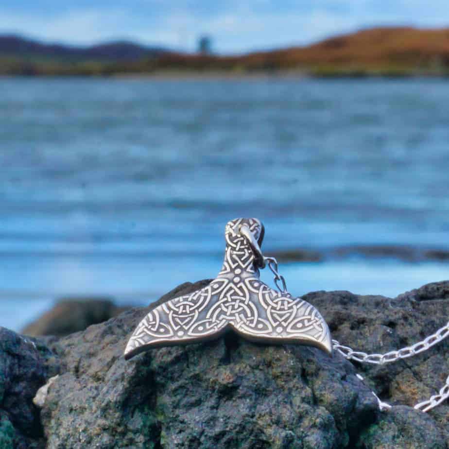Silver whale tail pendant with Celtic knotwork, handmade by Drift Designs Mull